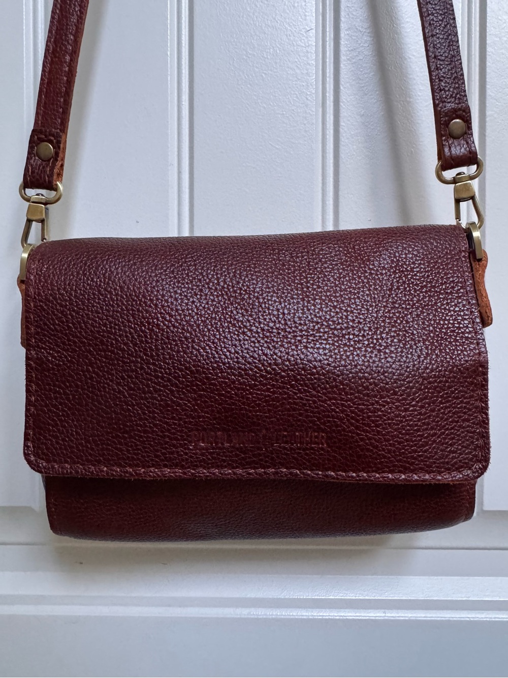 Portland Leather Mini Metro Crossbody Bag in Nutmeg. 8” by 5.75” by 2.25”